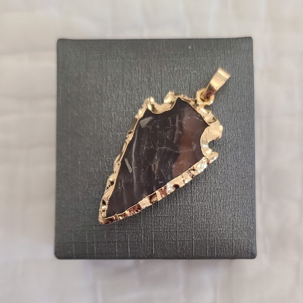 Unique Gold-Rimmed Arrowhead Pendant